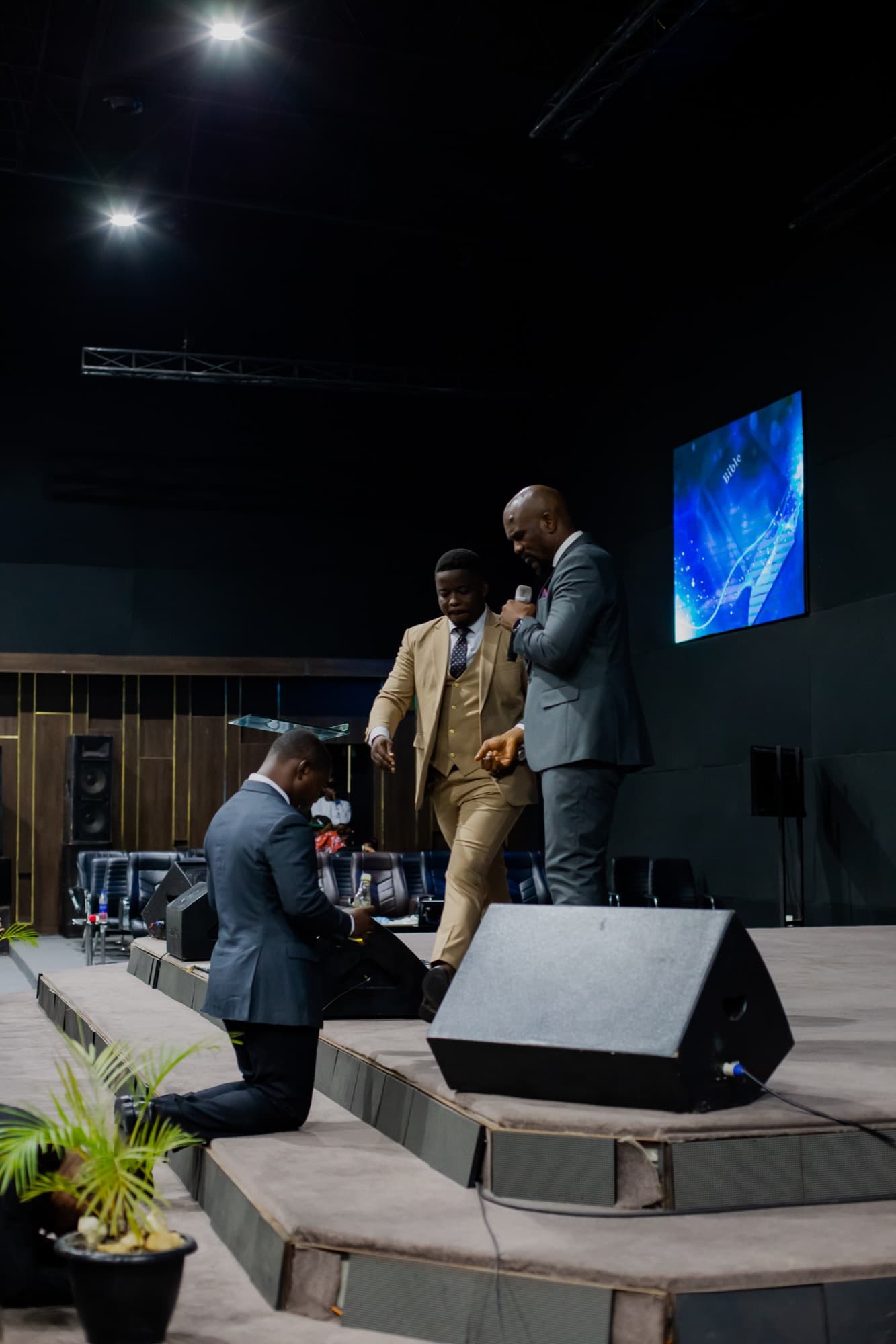 A brother in prayer at the Men's Convention