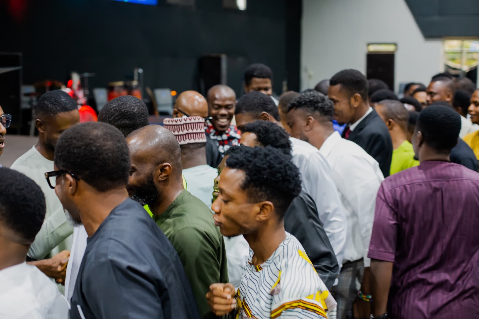 Authentic Men in worship and fellowship together at the Men's Convention